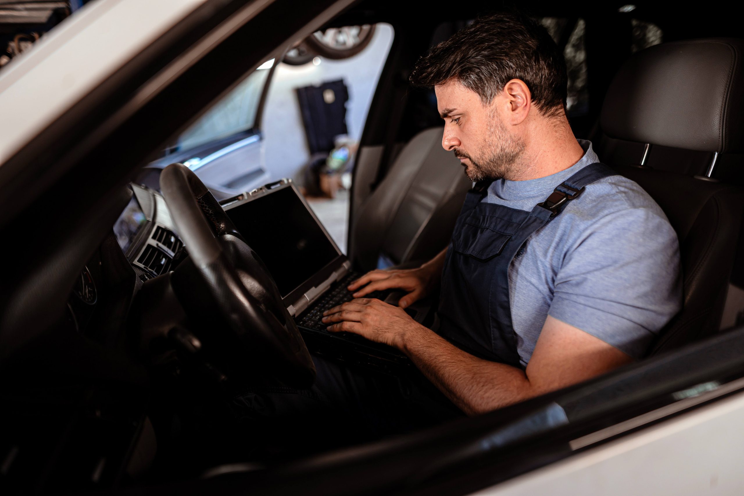 Auto locksmith using diagnostic equipment for car key programming in Felixstowe